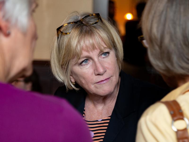 Democratic gubernatorial candidate Cathy Glasson campaigns one week before the primary election in a Des Moines restaurant. She says she thinks in order to win against Republican Gov. Kim Reynolds, she and her fellow candidates need to run far to the left Democratic gubernatorial candidate Cathy Glasson campaigns one week before the primary election in a Des Moines restaurant. She says she thinks in order to win against Republican Gov. Kim Reynolds, she and her fellow candidates need to run far to the left