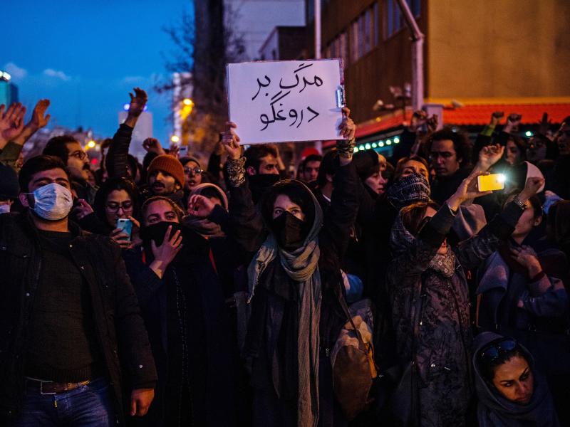 Mourners chant while gathering in Tehran over the weekend for a vigil for victims of Iran's unintentional downing of a Ukrainian airliner. As protests continue, Iran says it has made several arrests in the catastrophe. Mourners chant while gathering in Tehran over the weekend for a vigil for victims of Iran's unintentional downing of a Ukrainian airliner. As protests continue, Iran says it has made several arrests in the catastrophe.