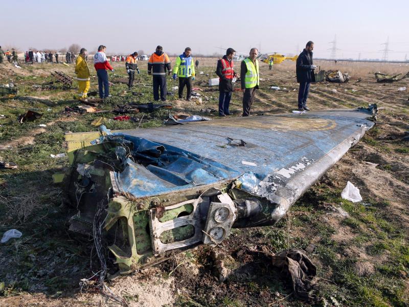 Rescue teams examine the wreckage of the Ukrainian airliner that was shot down shortly after takeoff in the Iranian capital, Tehran, on Jan. 8. Iran says a tragic series of mistakes led to the missile strike. Rescue teams examine the wreckage of the Ukrainian airliner that was shot down shortly after takeoff in the Iranian capital, Tehran, on Jan. 8. Iran says a tragic series of mistakes led to the missile strike.