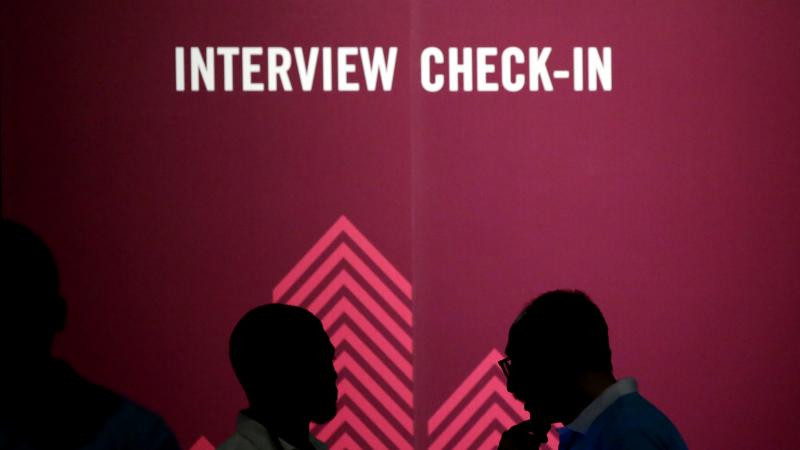 Job seekers chat during an employment event in Dallas last month. Under the new administration, Republicans are starting to see the economy through rose-colored glasses. Job seekers chat during an employment event in Dallas last month. Under the new administration, Republicans are starting to see the economy through rose-colored glasses.