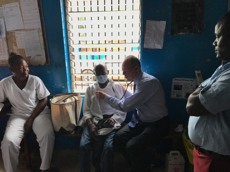 Dr. Paul Farmer examines a tuberculosis patient in Monrovia, Liberia. Dr. Paul Farmer examines a tuberculosis patient in Monrovia, Liberia.
