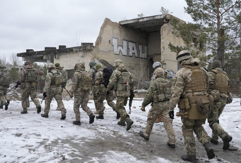 Members of Ukraine's Territorial Defense Forces, volunteer military units, train close to Kyiv on Saturday. Dozens of civilians have been joining Ukraine's army reserves in recent weeks amid fears about Russian invasion. Members of Ukraine's Territorial Defense Forces, volunteer military units, train close to Kyiv on Saturday. Dozens of civilians have been joining Ukraine's army reserves in recent weeks amid fears about Russian invasion.