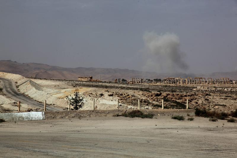 Smoke rises after a Syrian Rocket launcher shell on Islamic State positions in the ancient oasis city of Palmyra, about 215 kilometers northeast of Damascus on Tuesday. News reports say the Islamic State has taken control of the city. Smoke rises after a Syrian Rocket launcher shell on Islamic State positions in the ancient oasis city of Palmyra, about 215 kilometers northeast of Damascus on Tuesday. News reports say the Islamic State has taken control of the city.