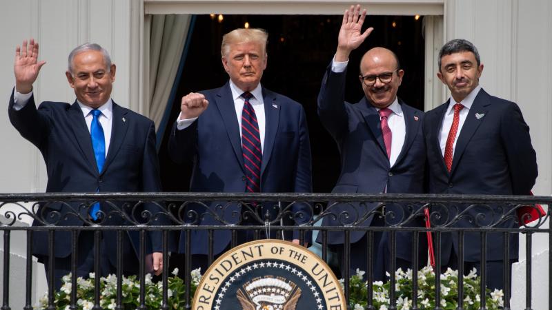Israeli Prime Minister Benjamin Netanyahu (from left), President Trump, Bahraini Foreign Minister Abdullatif bin Rashid Al Zayani and Emirati Foreign Minister Abdullah bin Zayed Al Nahyan wave from the Truman Balcony at the White House. The group particip Israeli Prime Minister Benjamin Netanyahu (from left), President Trump, Bahraini Foreign Minister Abdullatif bin Rashid Al Zayani and Emirati Foreign Minister Abdullah bin Zayed Al Nahyan wave from the Truman Balcony at the White House. The group particip