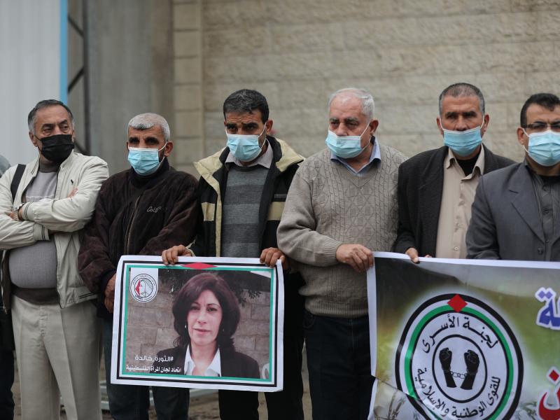 Members of the Palestinian Prisoner Society stage a demonstration outside the International Committee of the Red Cross building, demanding the World Health Organization put pressure on Israeli authorities to vaccinate Palestinian prisoners in Israeli jail Members of the Palestinian Prisoner Society stage a demonstration outside the International Committee of the Red Cross building, demanding the World Health Organization put pressure on Israeli authorities to vaccinate Palestinian prisoners in Israeli jail