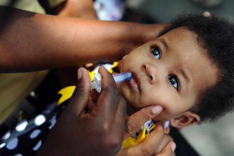 A nurse administers the rotavirus vaccine, given during the first year of a baby's life. A nurse administers the rotavirus vaccine, given during the first year of a baby's life.