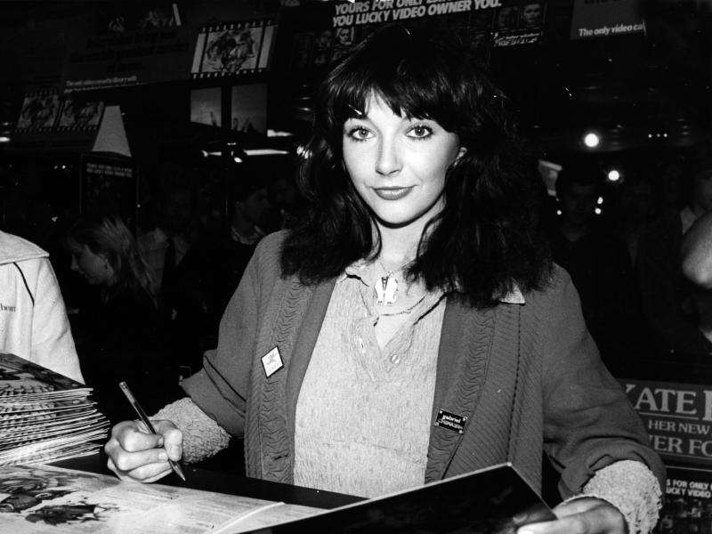 Kate Bush signing records in 1980. Kate Bush signing records in 1980.