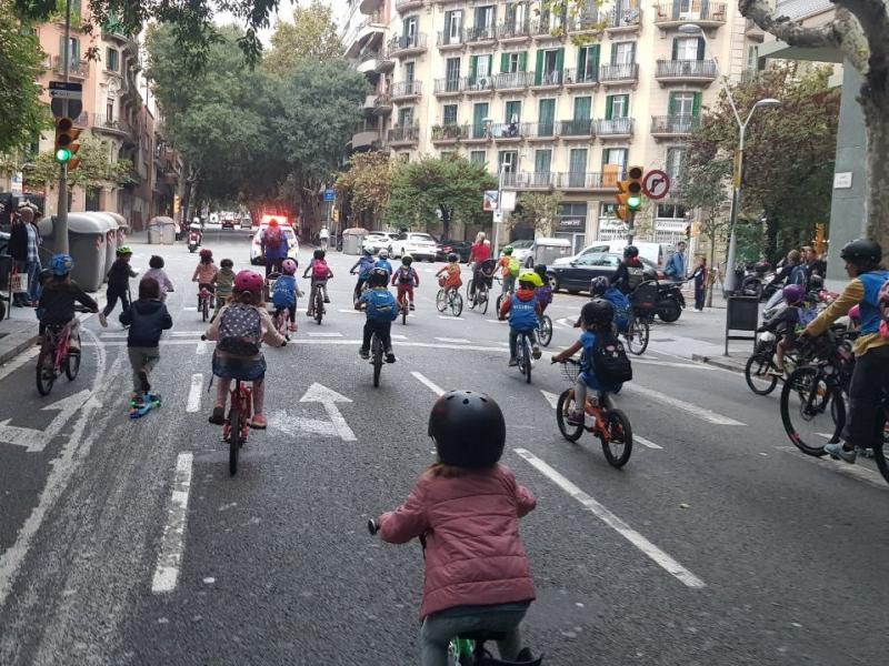 Children joining the bicibús in the Eixample district of Barcelona, Spain, make their way to school on a recent Friday morning. The community is hoping to build a school-friendly bike lane for a safer commute for kids. Children joining the bicibús in the Eixample district of Barcelona, Spain, make their way to school on a recent Friday morning. The community is hoping to build a school-friendly bike lane for a safer commute for kids.