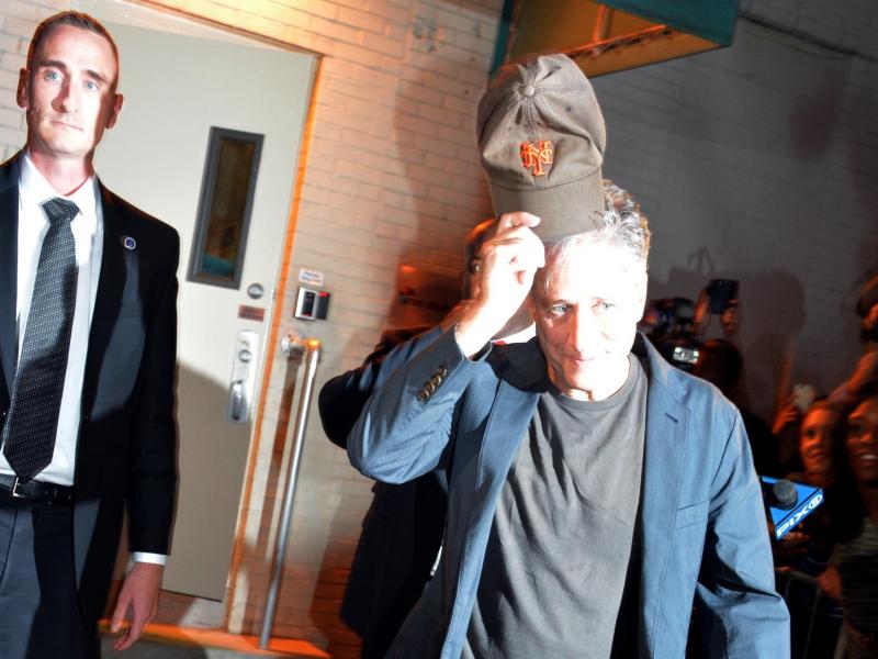 Jon Stewart leaves the studio Thursday after taping his final episode of The Daily Show with Jon Stewart in New York. Jon Stewart leaves the studio Thursday after taping his final episode of The Daily Show with Jon Stewart in New York.