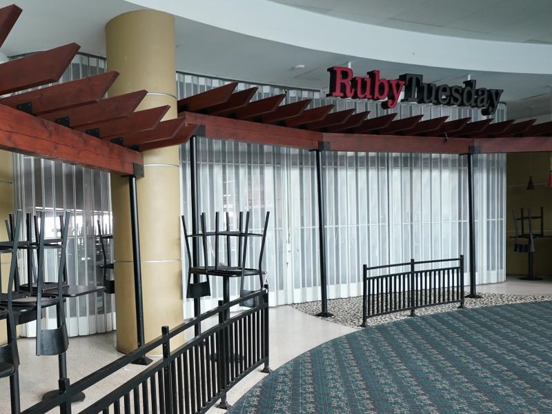 Chairs are stacked outside a closed Ruby Tuesday restaurant at Orlando Intercontinental Airport on May 24, 2020. Chairs are stacked outside a closed Ruby Tuesday restaurant at Orlando Intercontinental Airport on May 24, 2020.