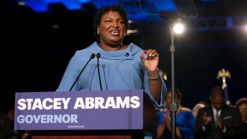 Democratic gubernatorial candidate Stacey Abrams addresses supporters at an election watch party on Tuesday. Abrams has not conceded to her Republican opponent, Brian Kemp, contending there are thousands of absentee and provisional ballots yet to be count Democratic gubernatorial candidate Stacey Abrams addresses supporters at an election watch party on Tuesday. Abrams has not conceded to her Republican opponent, Brian Kemp, contending there are thousands of absentee and provisional ballots yet to be count