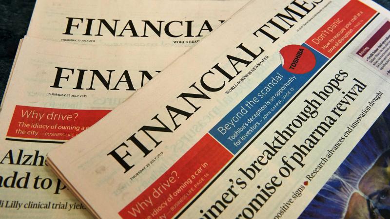 Copies of the Financial Times newspaper are displayed for a photograph in London. British publisher Pearson is selling the paper to Japanese media company Nikkei. Copies of the Financial Times newspaper are displayed for a photograph in London. British publisher Pearson is selling the paper to Japanese media company Nikkei.