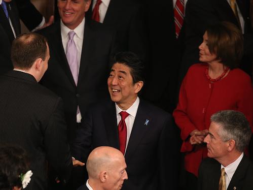 Prime Minister Shinzo Abe is greeted by members before speaking to a joint meeting of Congress, the first Japanese prime minister to do so. Prime Minister Shinzo Abe is greeted by members before speaking to a joint meeting of Congress, the first Japanese prime minister to do so.