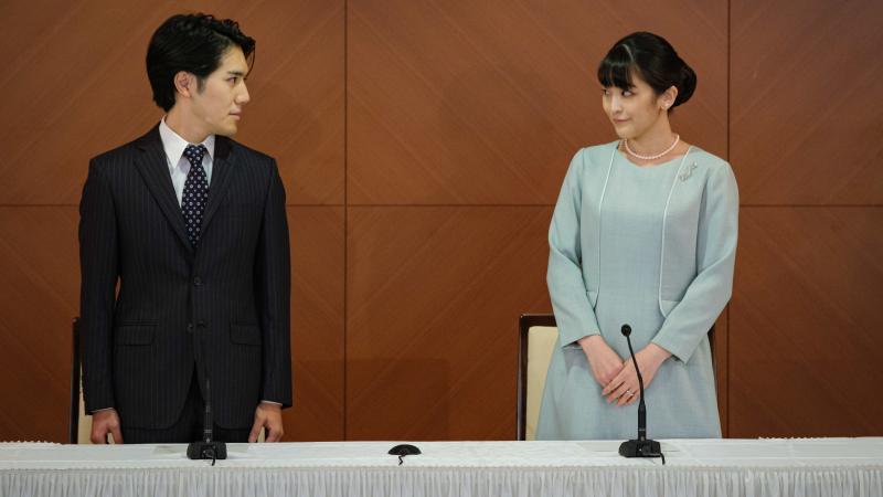Princess Mako, who became Mako Komuro, and her husband, Kei Komuro, pose during a news conference at Grand Arc Hotel on Tuesday in Tokyo to announce their wedding. Princess Mako, who became Mako Komuro, and her husband, Kei Komuro, pose during a news conference at Grand Arc Hotel on Tuesday in Tokyo to announce their wedding.