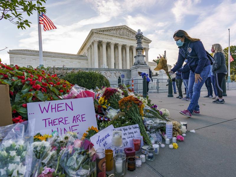 People gather at the Supreme Court on the morning after the death of Justice Ruth Bader Ginsburg. People gather at the Supreme Court on the morning after the death of Justice Ruth Bader Ginsburg.