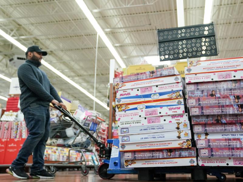 An employee stocks the toy section of a Walmart on Black Friday in King of Prussia, Pa. An employee stocks the toy section of a Walmart on Black Friday in King of Prussia, Pa.