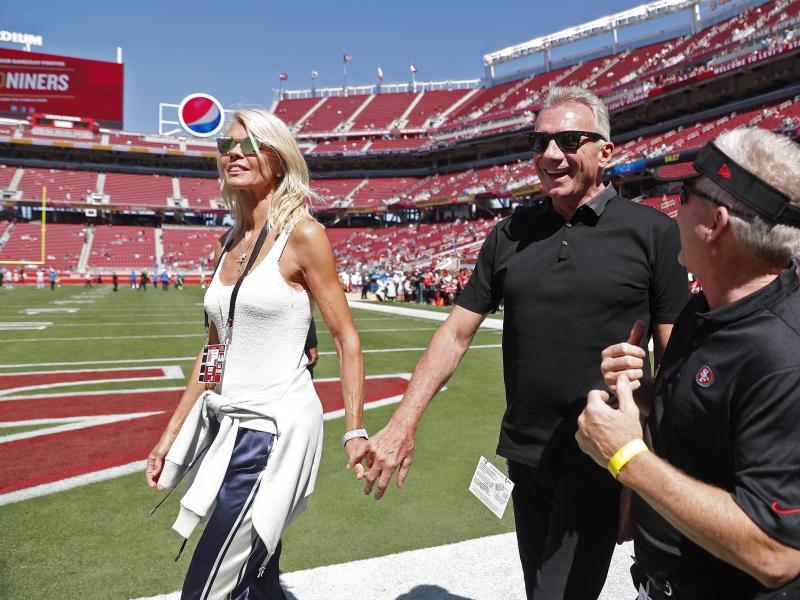 Joe Montana and his wife, left, Jennifer walk onto the field at Levi's Stadium before an NFL football game between the San Francisco 49ers and the Detroit Lions in Santa Clara, Calif., in 2018. Joe Montana and his wife, left, Jennifer walk onto the field at Levi's Stadium before an NFL football game between the San Francisco 49ers and the Detroit Lions in Santa Clara, Calif., in 2018.