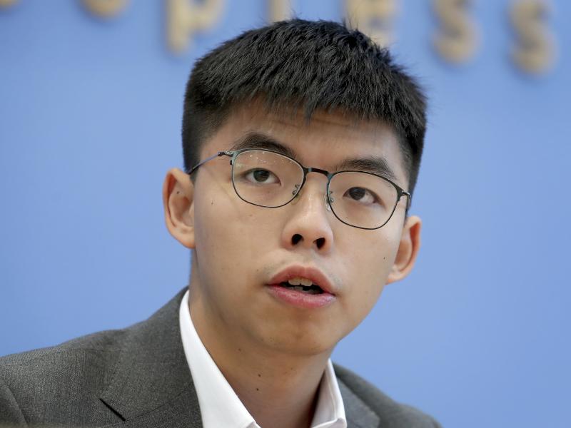 Hong Kong activist Joshua Wong addresses the media during a news conference in Berlin last month. Wong on Tuesday said Hong Kong authorities have disqualified him from upcoming local council elections. Hong Kong activist Joshua Wong addresses the media during a news conference in Berlin last month. Wong on Tuesday said Hong Kong authorities have disqualified him from upcoming local council elections.