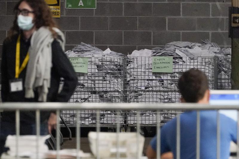 Election office workers process ballots at the Allegheny County elections returns warehouse in Pittsburgh, earlier this month. Election office workers process ballots at the Allegheny County elections returns warehouse in Pittsburgh, earlier this month.