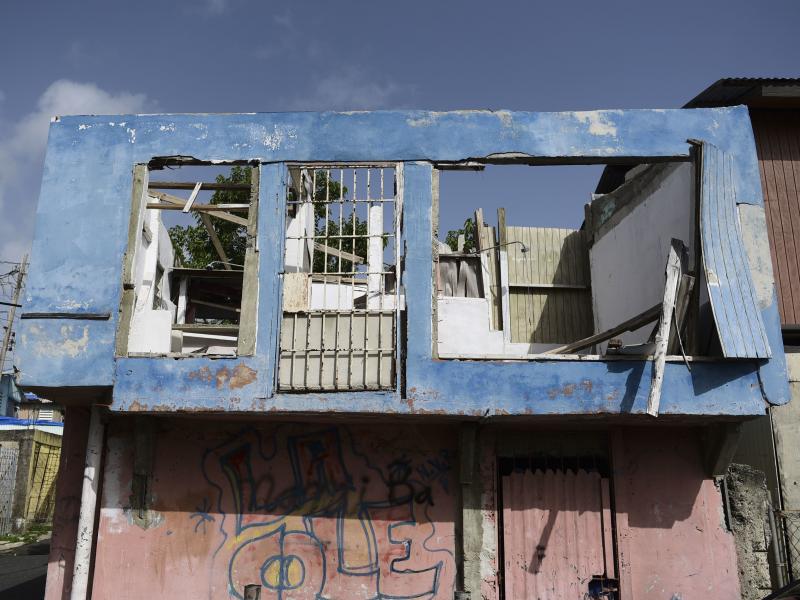 In this June 13 photo, a residence in the Figueroa neighborhood stands destroyed nine months after Hurricane Maria, in San Juan, Puerto Rico. On Wednesday a federal judge extended a temporary housing program for territory residents whose homes were destro In this June 13 photo, a residence in the Figueroa neighborhood stands destroyed nine months after Hurricane Maria, in San Juan, Puerto Rico. On Wednesday a federal judge extended a temporary housing program for territory residents whose homes were destro