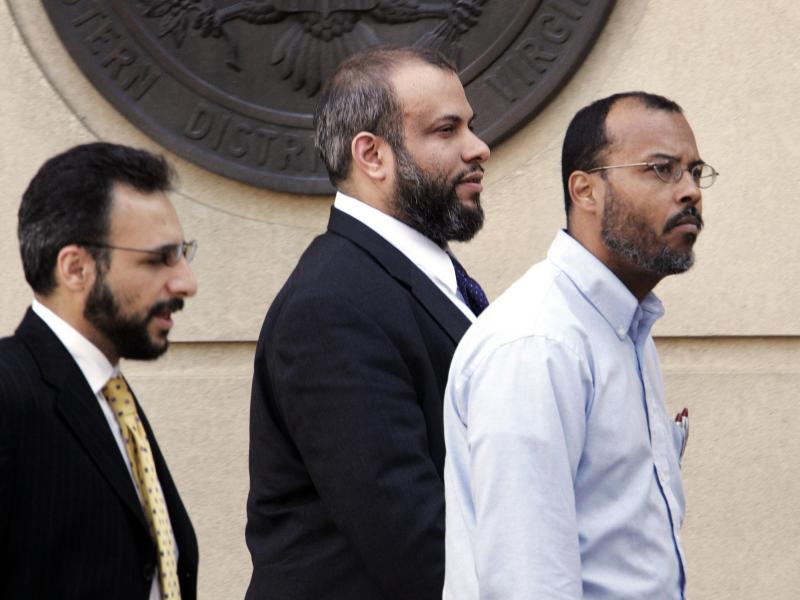 Ali Al-Tamimi (center) walks with two unidentified men as they leave federal court in Alexandria, Va., in April 2005. A federal judge has ordered him released from prison pending the outcome of his appeals, which have been unresolved for more than a decad Ali Al-Tamimi (center) walks with two unidentified men as they leave federal court in Alexandria, Va., in April 2005. A federal judge has ordered him released from prison pending the outcome of his appeals, which have been unresolved for more than a decad