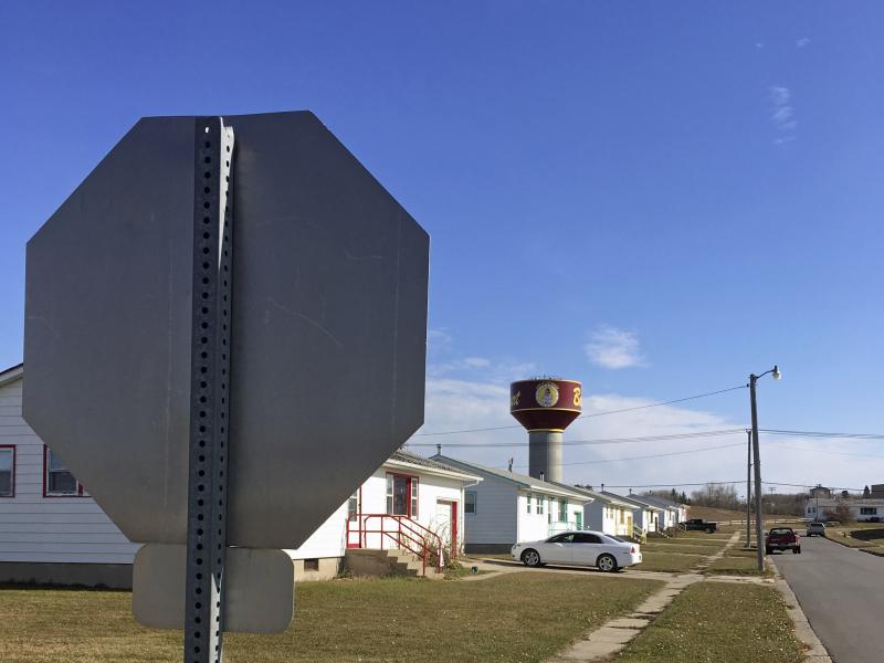 Residential roads with no street name or number signs, such as this one in Belcourt, N.D., are common on the Turtle Mountain Indian Reservation. Under recently tightened state rules, voters in North Dakota are required to present identification with a str Residential roads with no street name or number signs, such as this one in Belcourt, N.D., are common on the Turtle Mountain Indian Reservation. Under recently tightened state rules, voters in North Dakota are required to present identification with a str