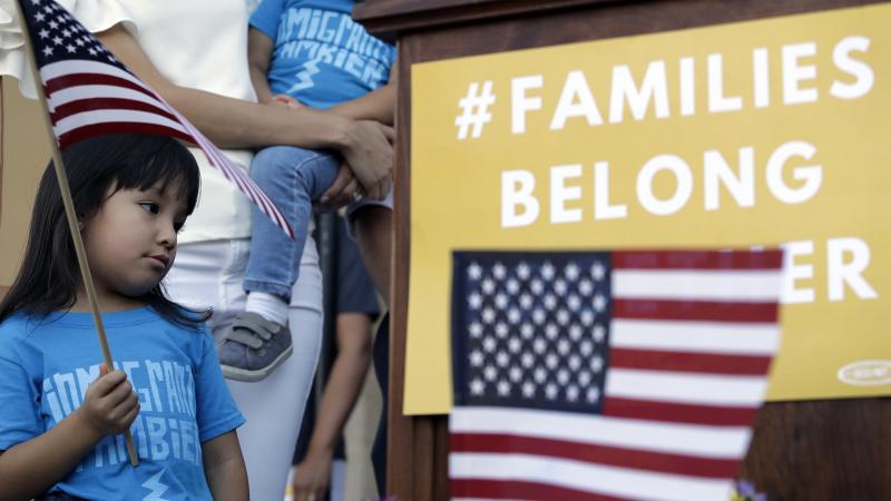 Andrea Elena Castro, daughter of Rep. Joaquin Castro, D-Texas, holds a U.S. flag during a Rally For Our Children event on May 31 to protest the "zero tolerance" immigration policy that has led to the separation of families. Andrea Elena Castro, daughter of Rep. Joaquin Castro, D-Texas, holds a U.S. flag during a Rally For Our Children event on May 31 to protest the "zero tolerance" immigration policy that has led to the separation of families.