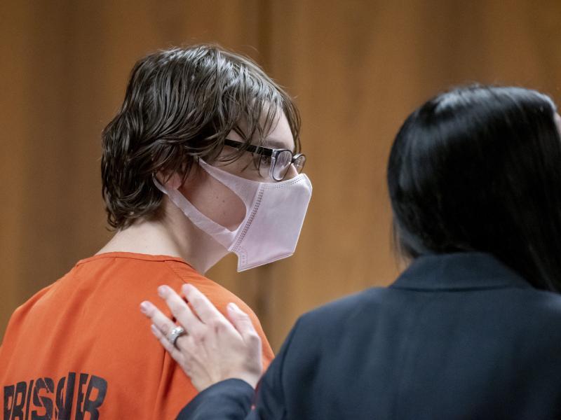 Ethan Crumbley attends a hearing at Oakland County circuit court in Pontiac, Mich., on Tuesday over where the teen will be detained as he awaits trial. Crumbley, 15, is charged with the fatal shooting of four fellow students and the wounding of seven othe Ethan Crumbley attends a hearing at Oakland County circuit court in Pontiac, Mich., on Tuesday over where the teen will be detained as he awaits trial. Crumbley, 15, is charged with the fatal shooting of four fellow students and the wounding of seven othe