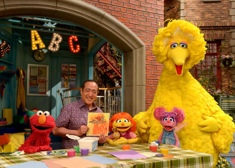 Julia (center) first appeared online and in printed materials as a part of Sesame Street's See Amazing in all Children initiative. She'll now appear on TV as well. From left, Elmo, Alan Muraoka, Julia, Abby Cadabby and Big Bird. Julia (center) first appeared online and in printed materials as a part of Sesame Street's See Amazing in all Children initiative. She'll now appear on TV as well. From left, Elmo, Alan Muraoka, Julia, Abby Cadabby and Big Bird.