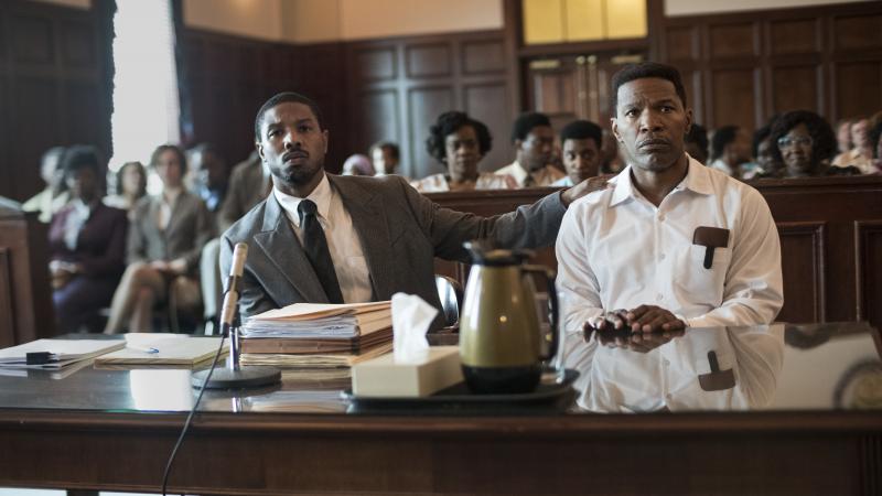 Bryan Stevenson (Michael B. Jordan) defends wrongly condemned Walter McMillan (Jamie Foxx) in Destin Daniel Cretton's film. Bryan Stevenson (Michael B. Jordan) defends wrongly condemned Walter McMillan (Jamie Foxx) in Destin Daniel Cretton's film.