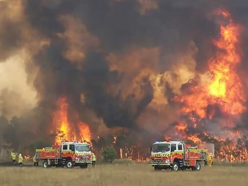 Wildfires burning across Australia's two most-populous states Tuesday trapped residents of a seaside town in apocalyptic conditions, destroyed properties and caused fatalities. Wildfires burning across Australia's two most-populous states Tuesday trapped residents of a seaside town in apocalyptic conditions, destroyed properties and caused fatalities.