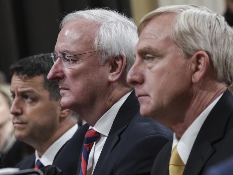 From left, Steven Engel, former assistant attorney general for the Office of Legal Counsel, Jeffrey Rosen, former acting attorney general, and Richard Donoghue, former acting deputy attorney General, testify before the House Select Committee to Investigat From left, Steven Engel, former assistant attorney general for the Office of Legal Counsel, Jeffrey Rosen, former acting attorney general, and Richard Donoghue, former acting deputy attorney General, testify before the House Select Committee to Investigat