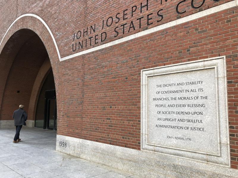 Etchings on the federal courthouse in Boston acclaim a well-administered justice system, but many working in the building say that is getting harder, given the continuing federal shutdown. Etchings on the federal courthouse in Boston acclaim a well-administered justice system, but many working in the building say that is getting harder, given the continuing federal shutdown.