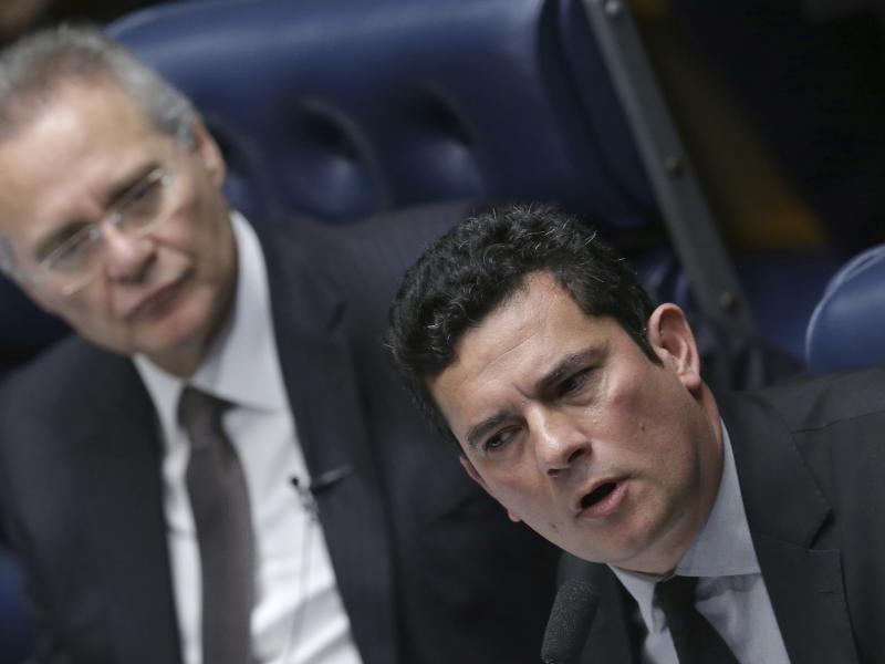 Brazilian Federal Judge Sergio Moro (right) is leading his country's corruption probe of state-run oil company Petrobras. Two Brazilian companies have agreed to more than $3.5 billion in fines for violating U.S. bribery laws in their dealings with Petrobr Brazilian Federal Judge Sergio Moro (right) is leading his country's corruption probe of state-run oil company Petrobras. Two Brazilian companies have agreed to more than $3.5 billion in fines for violating U.S. bribery laws in their dealings with Petrobr
