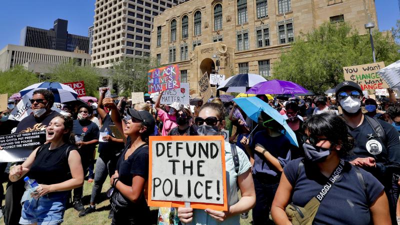 Protesters rally in June of last year in Phoenix demanding that the Phoenix City Council defund the Phoenix Police Department. Protesters rally in June of last year in Phoenix demanding that the Phoenix City Council defund the Phoenix Police Department.