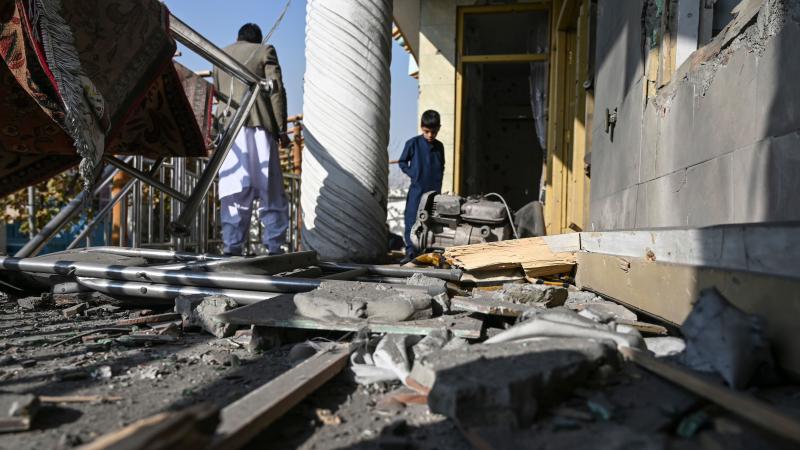 Residents inspect a damaged house after several rockets landed Saturday in Afghanistan's capital, Kabul. The Islamic State claimed responsibility for the attack, which comes the same day as U.S. Secretary of State Mike Pompeo's meeting with Taliban leader Residents inspect a damaged house after several rockets landed Saturday in Afghanistan's capital, Kabul. The Islamic State claimed responsibility for the attack, which comes the same day as U.S. Secretary of State Mike Pompeo's meeting with Taliban leader