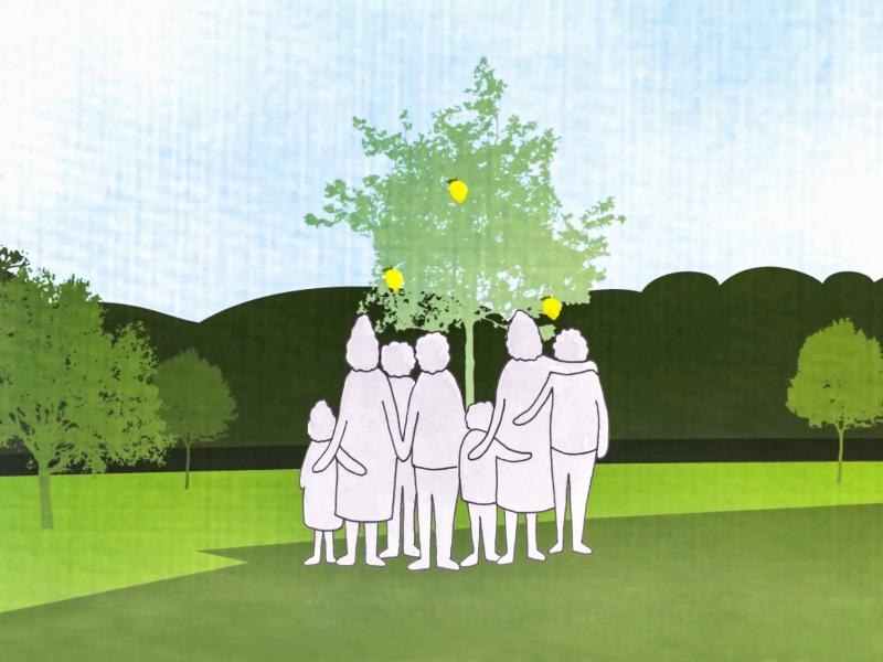 Family standing in front of a lemon tree. Family standing in front of a lemon tree.