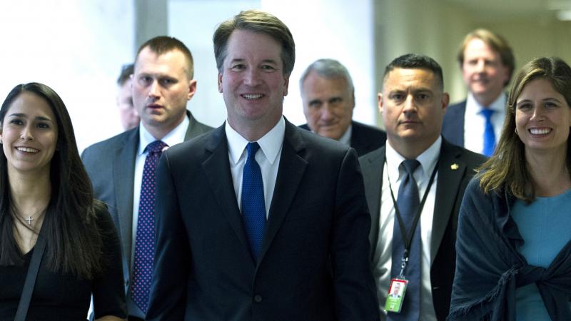 Supreme Court nominee Judge Brett Kavanaugh walks to meet with senators on Capitol Hill last month. He faces days of questioning from senators beginning Tuesday. Supreme Court nominee Judge Brett Kavanaugh walks to meet with senators on Capitol Hill last month. He faces days of questioning from senators beginning Tuesday.