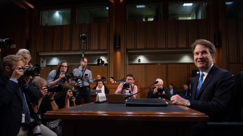 Judge Brett Kavanaugh arrives to testify during the second day of his Supreme Court confirmation hearings on Wednesday. Judge Brett Kavanaugh arrives to testify during the second day of his Supreme Court confirmation hearings on Wednesday.