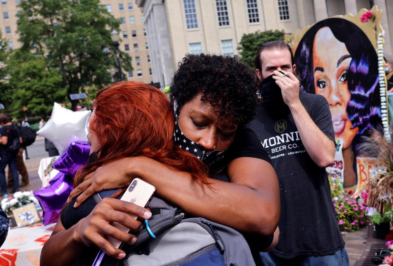 People react after a decision in the criminal case against police officers involved in the death of Breonna Taylor, who was shot dead by police in her apartment, in Louisville. People react after a decision in the criminal case against police officers involved in the death of Breonna Taylor, who was shot dead by police in her apartment, in Louisville.