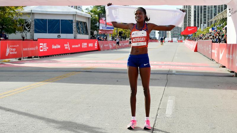 Kenya's Brigid Kosgei won the 2019 Chicago Marathon on Sunday with at time of 2 hours 14 minutes and 4 seconds. Kosgei's time also marks a new world record marathon time. Kenya's Brigid Kosgei won the 2019 Chicago Marathon on Sunday with at time of 2 hours 14 minutes and 4 seconds. Kosgei's time also marks a new world record marathon time.
