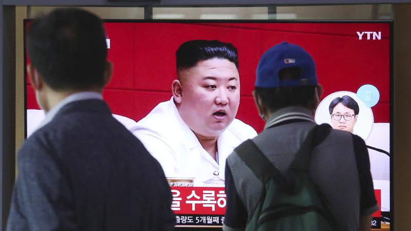 People at the Seoul Railway Station in Seoul watch a news program Friday showing a file image of North Korean leader Kim Jong Un, who said he was sorry over the killing of a South Korean fisheries official near the two countries' disputed sea boundary. People at the Seoul Railway Station in Seoul watch a news program Friday showing a file image of North Korean leader Kim Jong Un, who said he was sorry over the killing of a South Korean fisheries official near the two countries' disputed sea boundary.