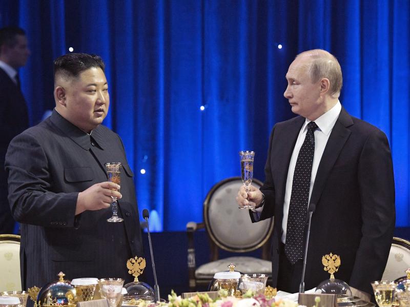 Russian President Vladimir Putin (right) toasts with North Korea's leader Kim Jong Un after their talks in Vladivostok, Russia, on Thursday. Russian President Vladimir Putin (right) toasts with North Korea's leader Kim Jong Un after their talks in Vladivostok, Russia, on Thursday.