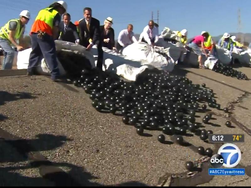In this photo, obtained from ABC7 News in Los Angeles, the shade balls are released into the reservoir. In this photo, obtained from ABC7 News in Los Angeles, the shade balls are released into the reservoir.