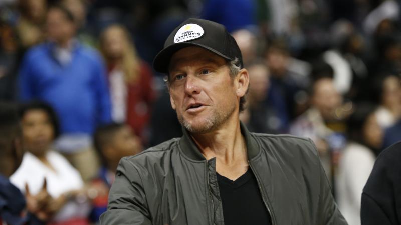 Lance Armstrong attends a 2017 NBA game in Atlanta. Lance Armstrong attends a 2017 NBA game in Atlanta.