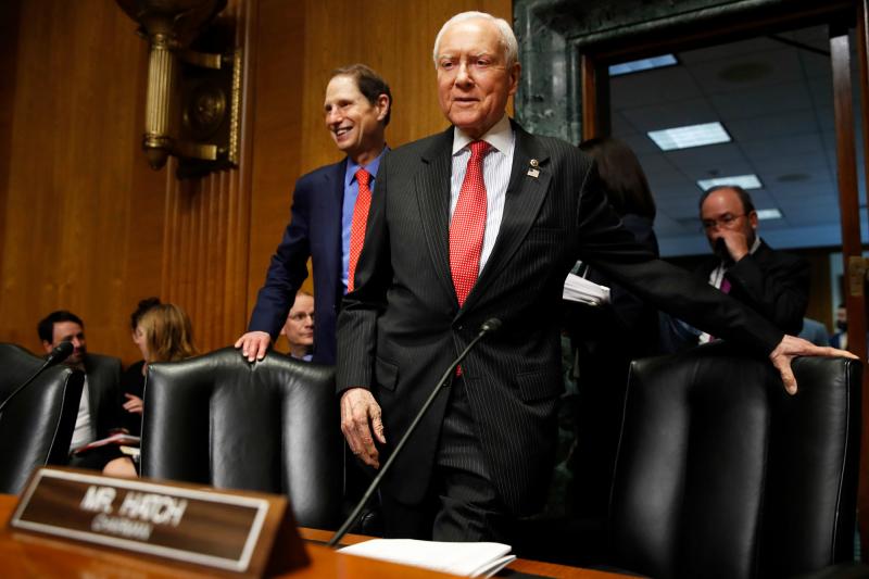Senate Finance Committee Chairman Orrin Hatch, R-Utah, center, and ranking member Ron Wyden, D-Ore., have a plan to renew funding for the Children's Health Insurance Program, which lapsed Sept. 30. Senate Finance Committee Chairman Orrin Hatch, R-Utah, center, and ranking member Ron Wyden, D-Ore., have a plan to renew funding for the Children's Health Insurance Program, which lapsed Sept. 30.
