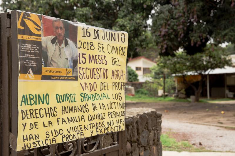 A sign at the front of Quiroz's home reads: "June 16, 2018, 15 months since the aggravated kidnapping of Professor Albino Quiroz Sandoval. The human rights of the victim and the family have been violated. There is no prompt and expeditious justice." A sign at the front of Quiroz's home reads: "June 16, 2018, 15 months since the aggravated kidnapping of Professor Albino Quiroz Sandoval. The human rights of the victim and the family have been violated. There is no prompt and expeditious justice."