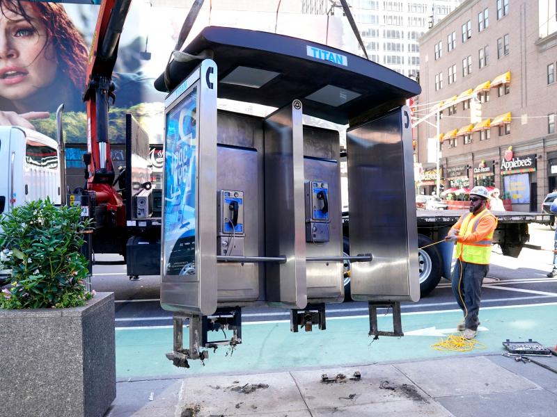 Workers remove the final New York City pay phone near Seventh Avenue and 50th Street in Midtown Manhattan on Monday. Despite the fanfare, there are still some pay phones standing in the city. Workers remove the final New York City pay phone near Seventh Avenue and 50th Street in Midtown Manhattan on Monday. Despite the fanfare, there are still some pay phones standing in the city.