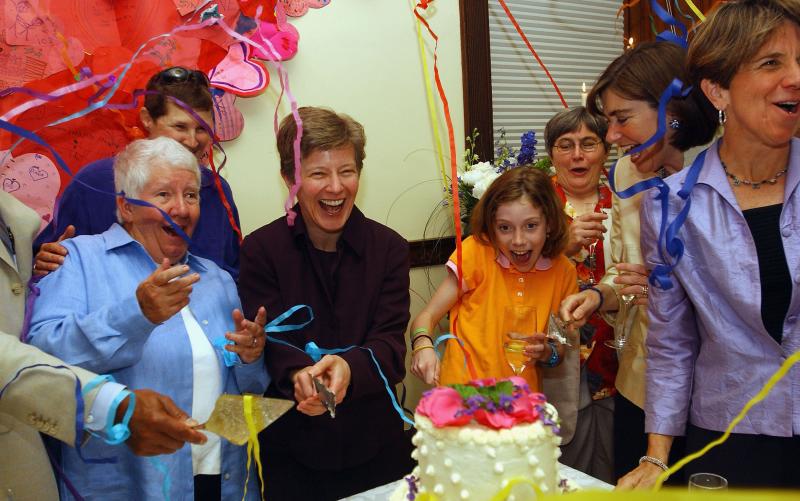 Bonauto celebrates on May 17, 2005, the one-year anniversary of legal same-sex marriage in Massachusetts. Bonauto argued the case that benefited couples like Hillary and Julie Goodridge (at right), here with their daughter Annie. Bonauto celebrates on May 17, 2005, the one-year anniversary of legal same-sex marriage in Massachusetts. Bonauto argued the case that benefited couples like Hillary and Julie Goodridge (at right), here with their daughter Annie.