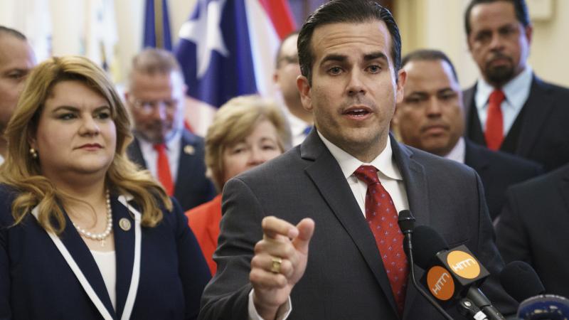 Puerto Rico Gov. Ricardo Rosselló, right, speaks during a ceremony on Capitol Hill on June 27, 2018. On Thursday, Rosselló demanded the resignation of any member of PREPA's board who refused to cut the new CEO's $750,000 salary. Puerto Rico Gov. Ricardo Rosselló, right, speaks during a ceremony on Capitol Hill on June 27, 2018. On Thursday, Rosselló demanded the resignation of any member of PREPA's board who refused to cut the new CEO's $750,000 salary.